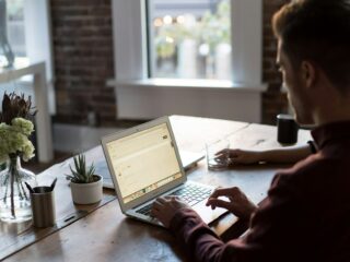 Man at a laptop in an office